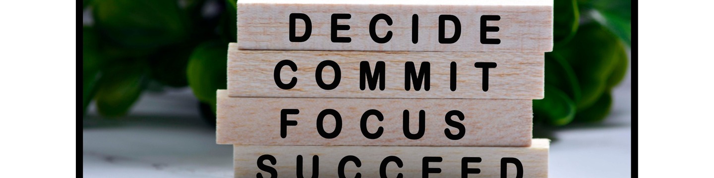 stacked blocks showing the words decide, commit, focus and succeed